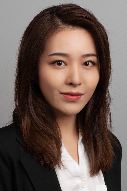The professional headshot of Aijia Yuan