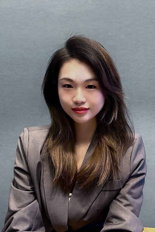 The professional headshot of Raina Zhang